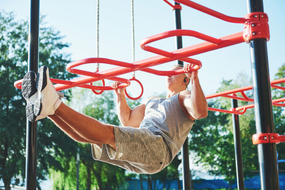 A parkour enthusiasts practicing parkour swings.