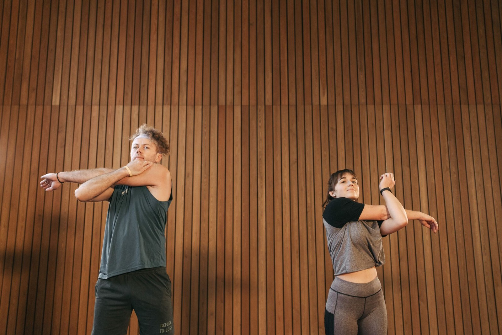 Dynamic stretching exercises as part of a pre-training warm-up.